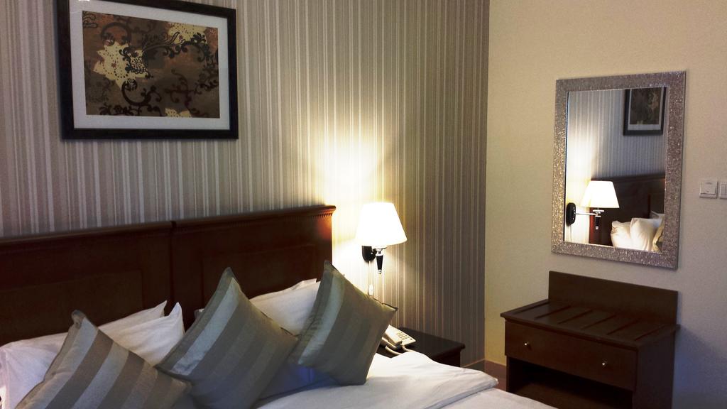 Legacy Hotel Apartments