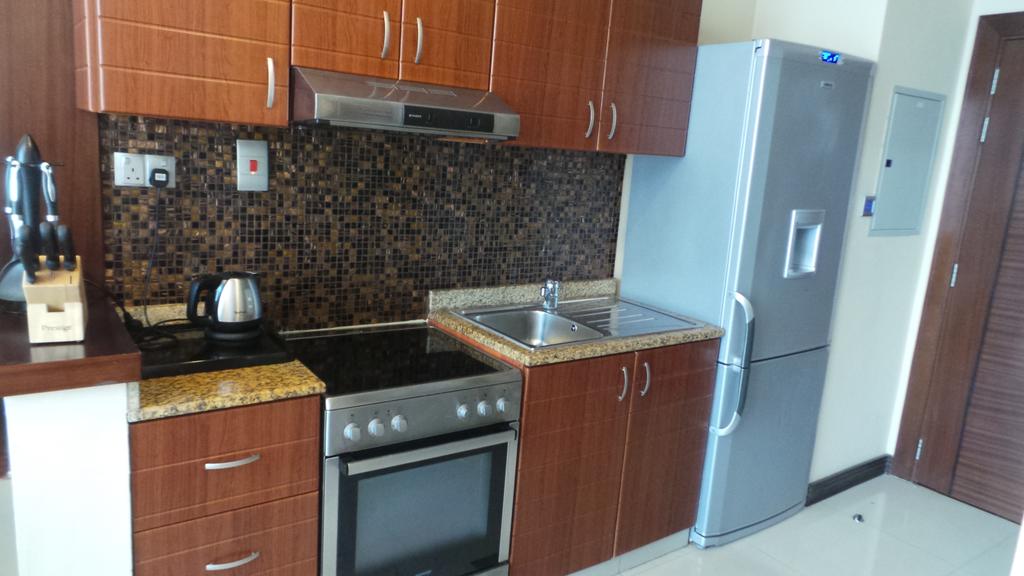 Xclusive Maples Hotel Apartments